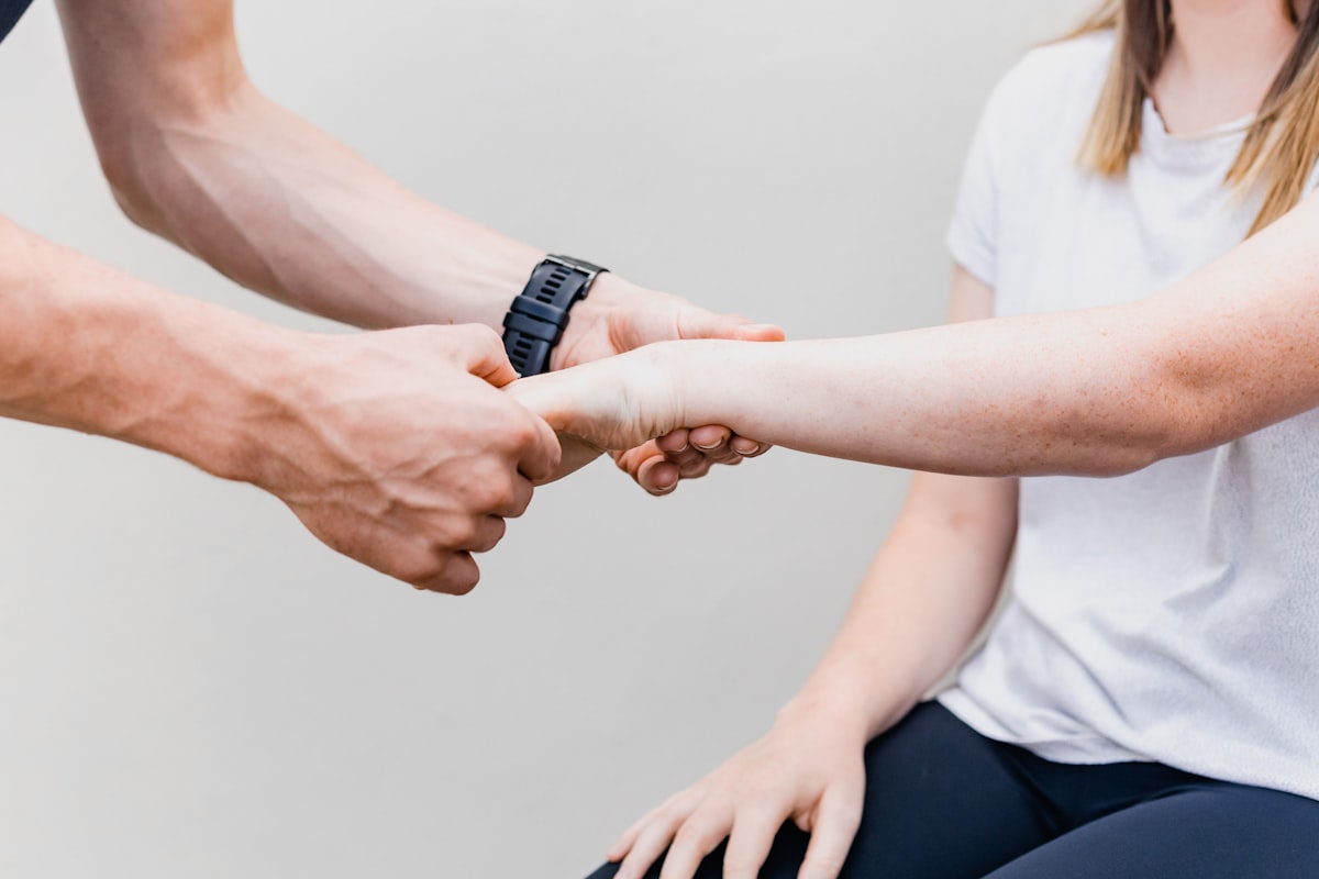 Person performing guided mobility exercise with proper posture and form